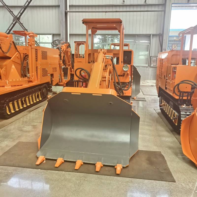 Chargeuse de roches à déversement latéral