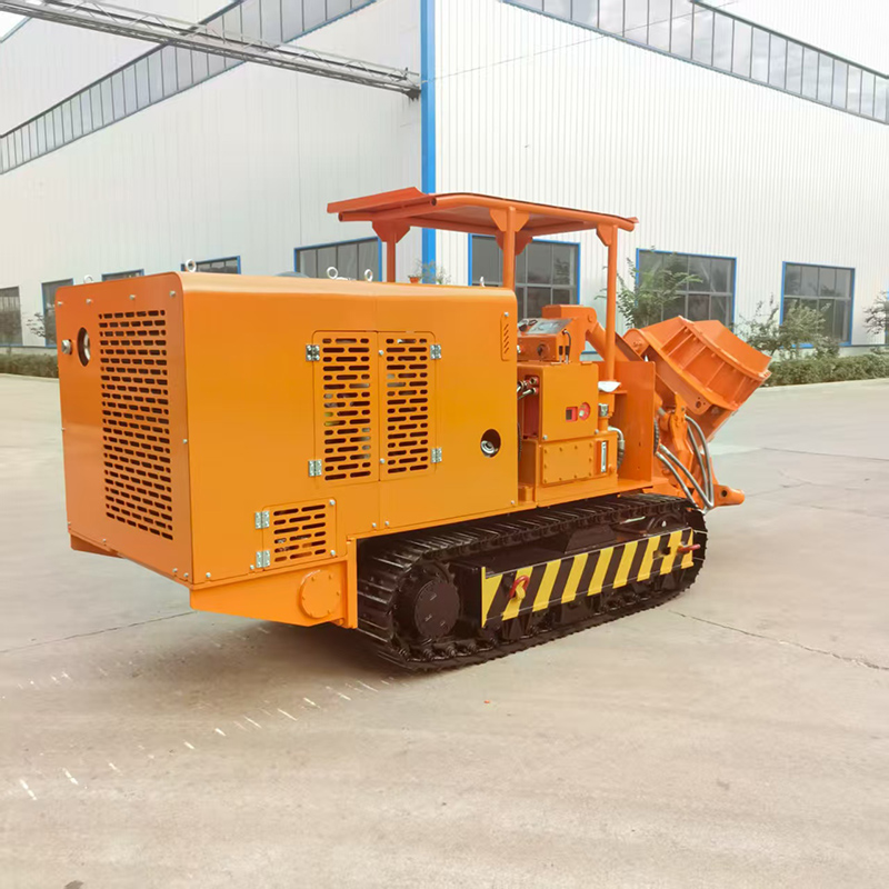 Carregadora de rochas com descarga lateral sobre rastos