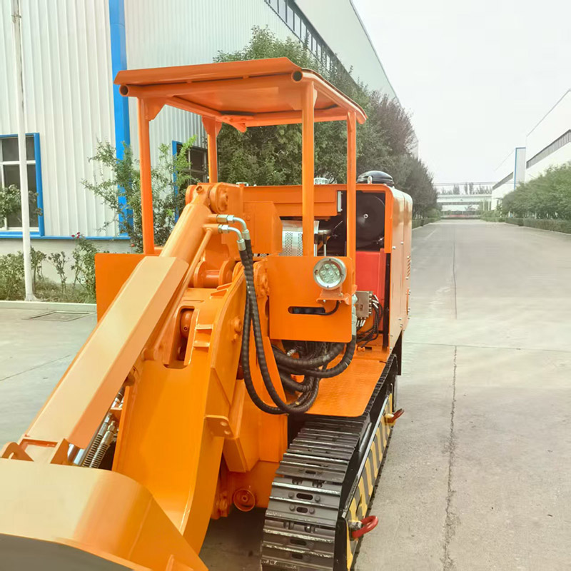 Chargeur de roches à déchargement latéral pour mines d'or