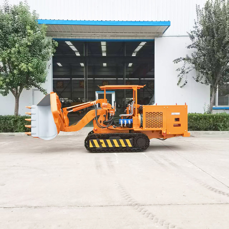 Carregador de rocha com descarga lateral e comando à distância