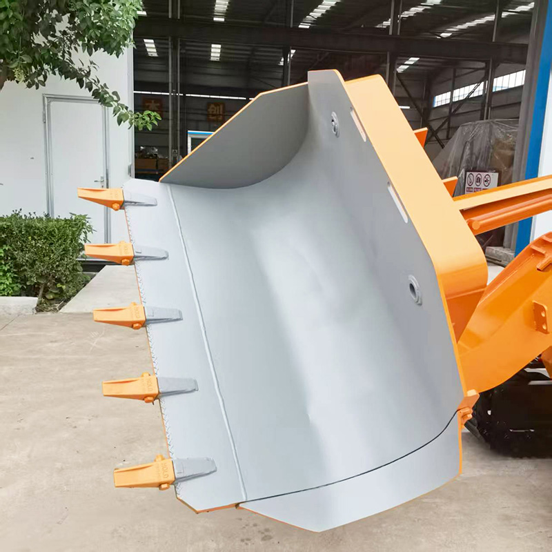 Carregador de rochas de descarga lateral pequena