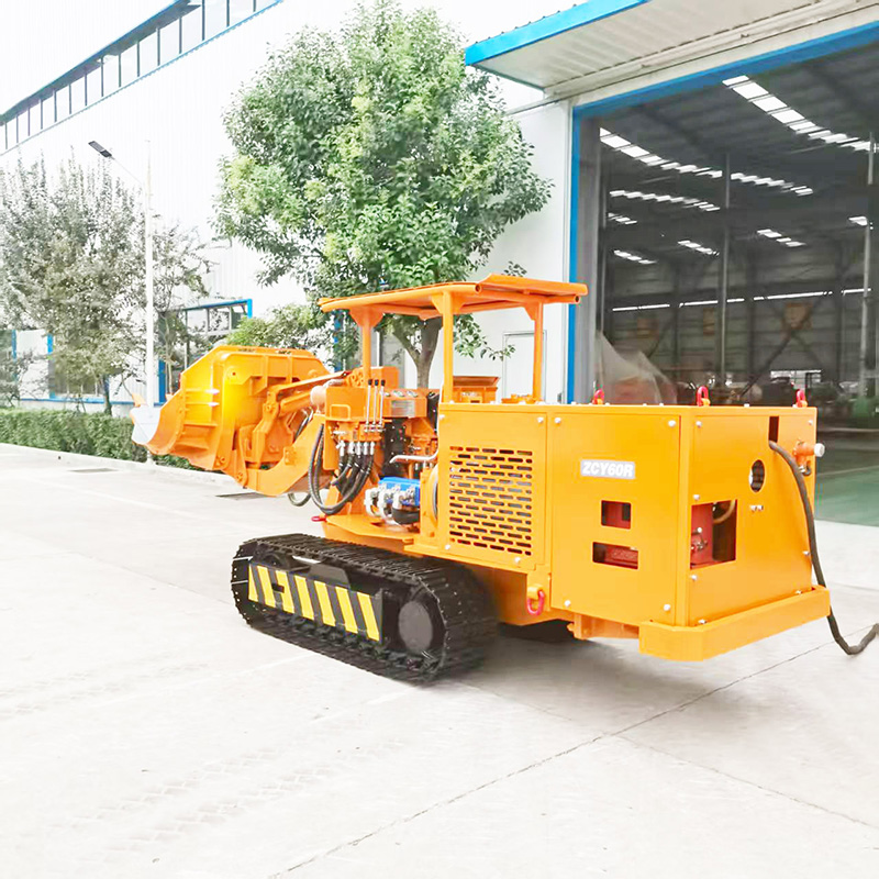 Carregador de rochas de descarga lateral para mineração