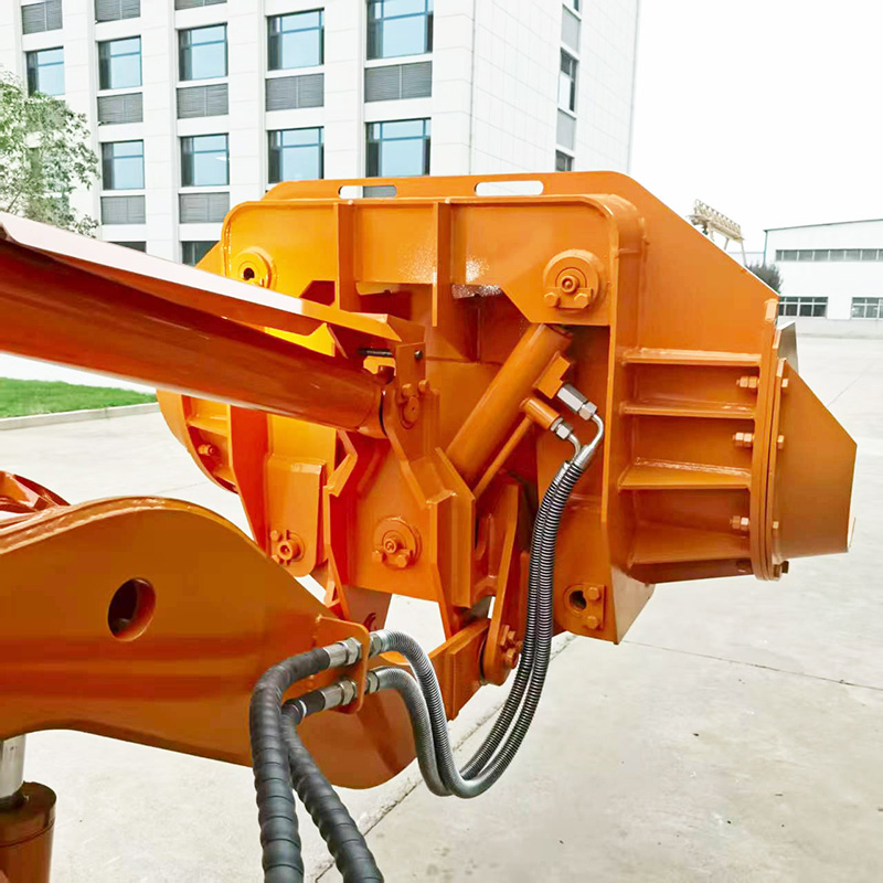 Carregadora de rochas de descarga lateral grande